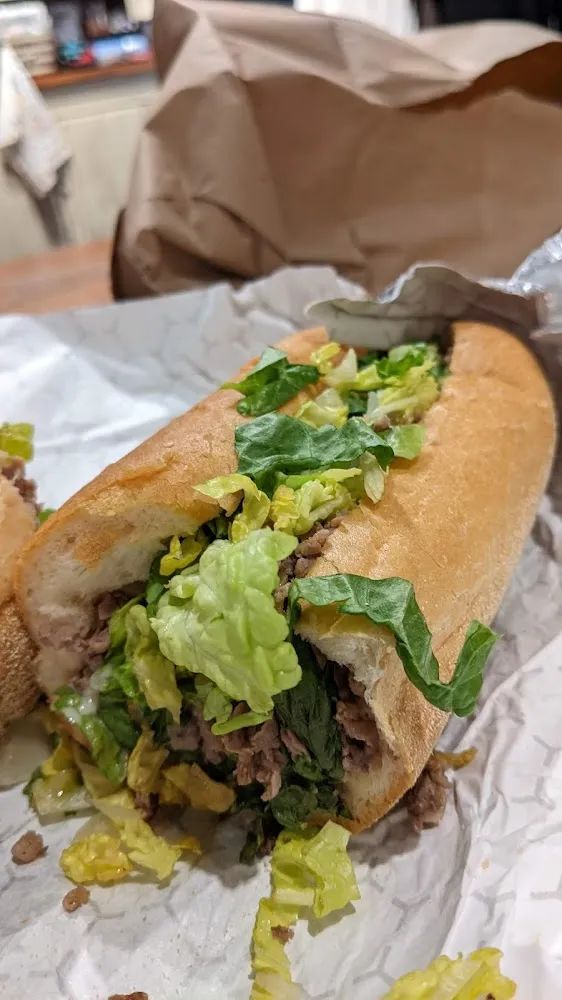 Cheesesteak Fried Onions Lettuce and Cherry Peppers